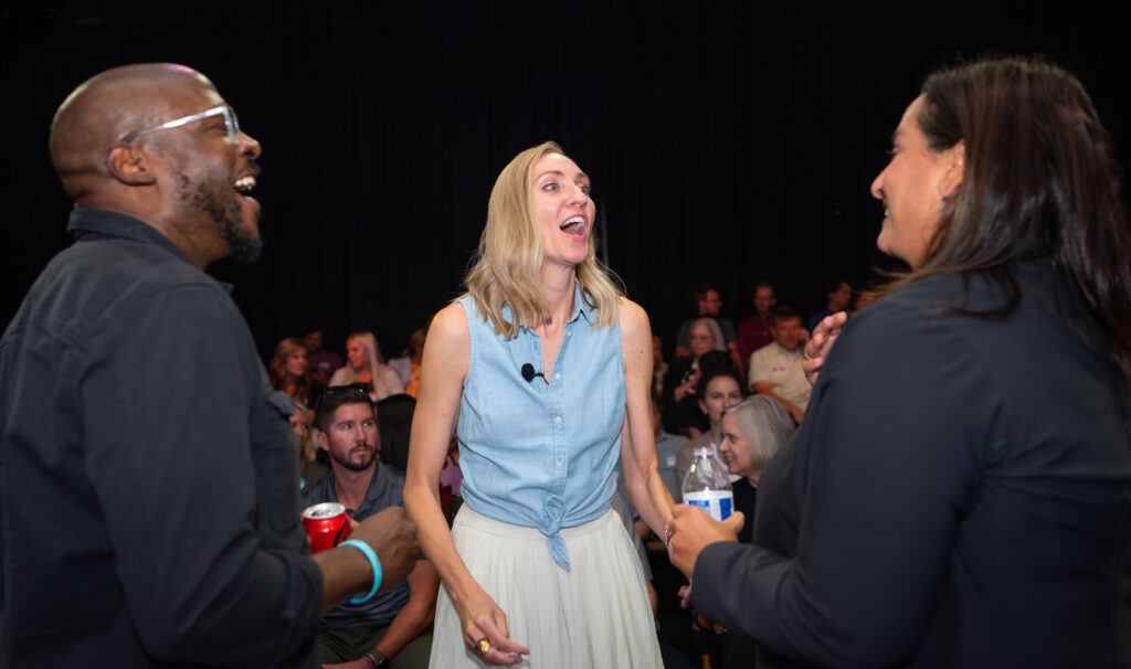 Image of panelists laughing